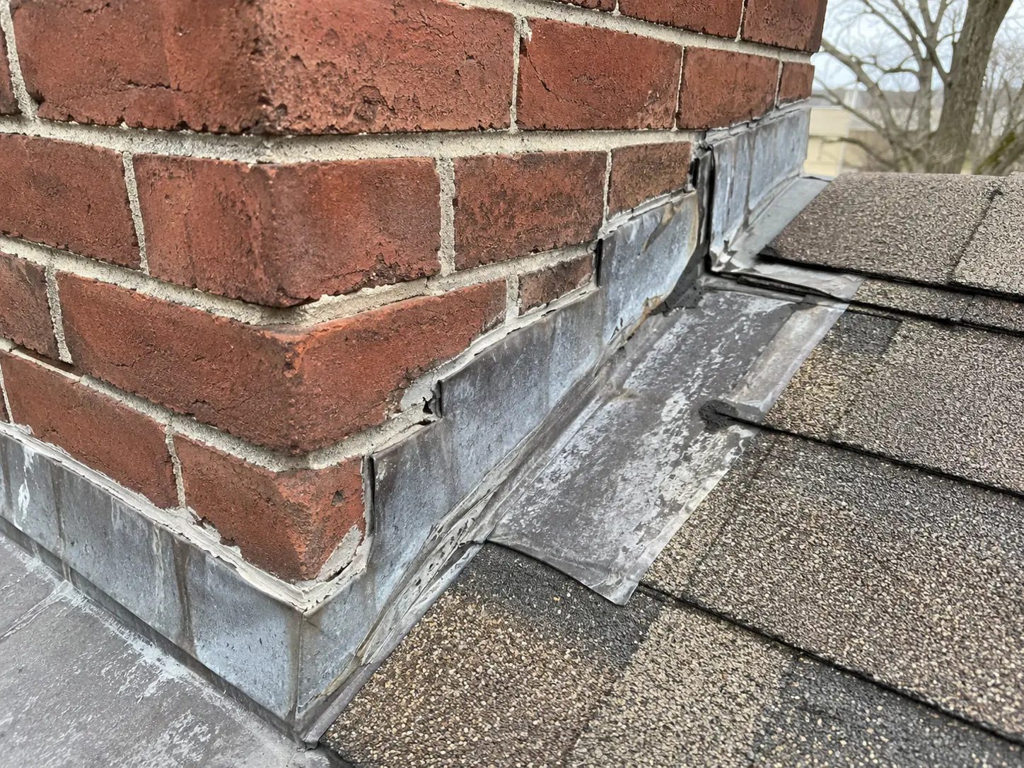 Illustrative flashing condition before repair; not a Charter Oak project